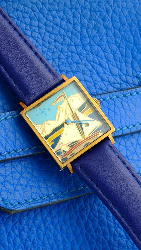 A yellow gold 'Sailing dial' wrist watch. Cool Watches Unique, Fun Watches, Unique Wrist Watch, Funky Watches, Unique Watches, Couple Fits, Vintage Timepiece, Retro Watches, Vintage Watches For Men