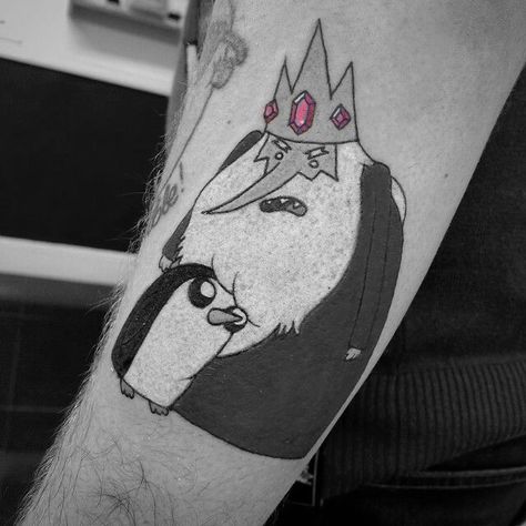 Gunther Tattoo Adventure Time, Ice King Tattoo, Aiden Tattoo, King Tattoo Ideas, Ice King Adventure Time, Simple Leg Tattoos, Cartoon Tattoo Ideas, Adventure Time Tattoo, Inspo Tattoo