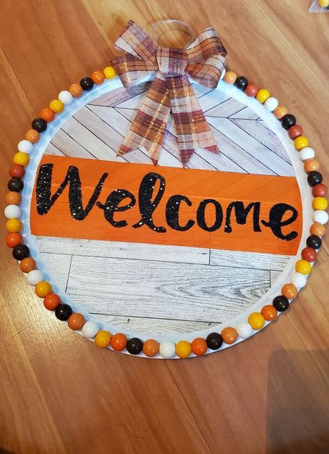 One thing I love about diy fall decor is that you can also use it for Thanksgiving decor! I am also a huge fan of pizza pan wreaths! I think my local Dollar Tree employees know that I use the pizza pans for crafting. I also found adhesive wood wallpaper at Dollar Tree. I was inspired to use the wood wallpaper for my Thanksgiving/Fall pizza pan wreath. The wood wallpaper gives the wreath a farmhouse look. :) Pizza Pan Plaid ribbon bow White Acrylic paint Foam paint brush 2 adhes… Mini Pumpkins Decor, Maple Leaf Decor, Fall Pizza, Wood Adhesive, Foam Paint, Diy Thanksgiving, Wood Bead Necklace, Plaid Ribbon, Wood Wallpaper