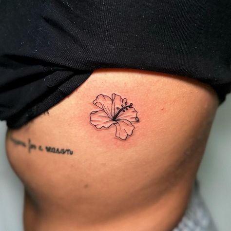 Hibiscus flower for @cescicollings 🌺 Thank you, it was great to see you again. 😁 . . . #hibiscus #hibiscusflower #hibiscustattoo #botanicaltattoo #flowertattoo #ribtattoo #fineline #delicatetattoo #femaninetattoo #inkedup Purple Hibiscus Tattoo, Hibiscus Arm Tattoo, Hibiscus Tattoo Behind Ear, Tiny Hibiscus Tattoo, Tattoo Hibiscus Flower, Hisbusic Flower Tattoo, Hawaii Flower Tattoo, Fine Line Hibiscus Tattoo, Small Hibiscus Tattoo