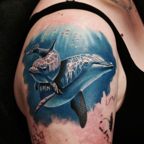 Dolphin Quarter Tattoo - Dolphins are lovely sea creatures which are well known for their ability of communication, sociable nature and high intelligence. Dolphin is also a global ambassador of Peace on Earth. Dolphin tattoos remind people of their symbolic meanings of peace, love, compassion and kindness. Dolphin Tattoo Meaning, Underwater Tattoo, Tatoo 3d, Dolphin Tattoo, Tier Tattoo, Dolphins Tattoo, Whale Tattoos, Men Tattoos, Ocean Tattoos