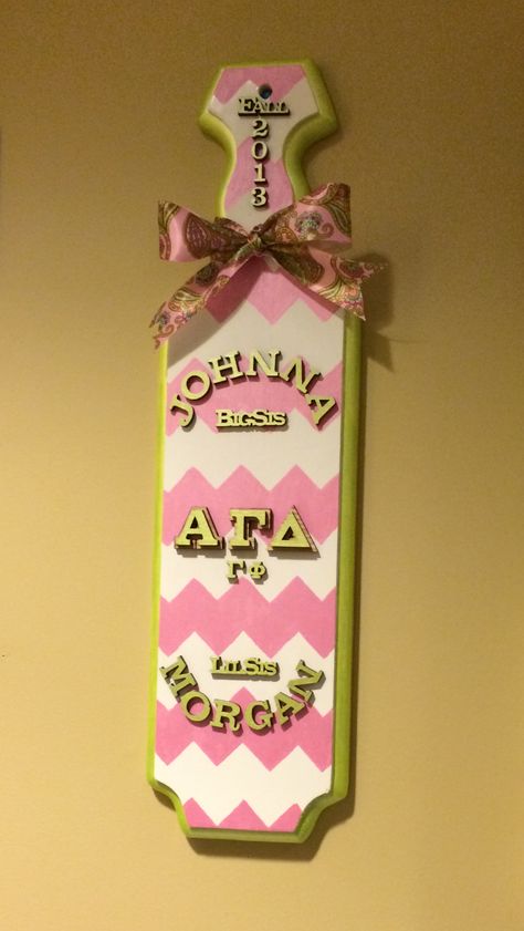 Chevron pink and green Alpha Gamma Delta sorority paddle that I made for my big, Johnna. Alpha Gamma Delta Paddle, Phi Sigma Pi, College Crafts, Sigma Lambda Gamma, Greek Crafts, Sigma Pi, Sigma Delta Tau, Phi Sigma Sigma, Sorority Paddles