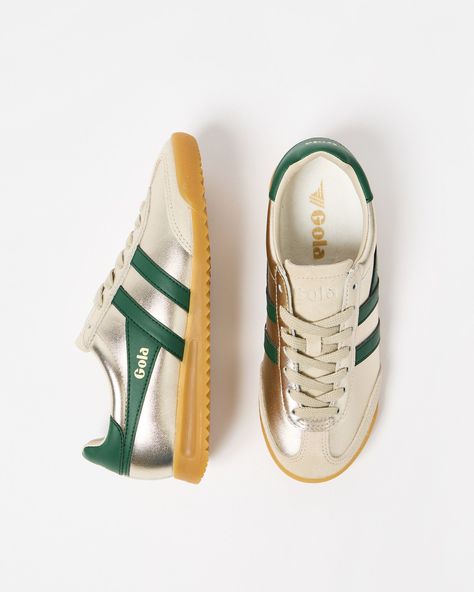 Gold metallic Gola trainers with a retro-inspired gum sole with cream suede and green leather side panels. Gola Trainers, Gold Trainers, Winter Work Wear, Floral Shirt Dress, Knitted Tops, Oliver Bonas, Winter Warmers, Side Panels, Green Leather