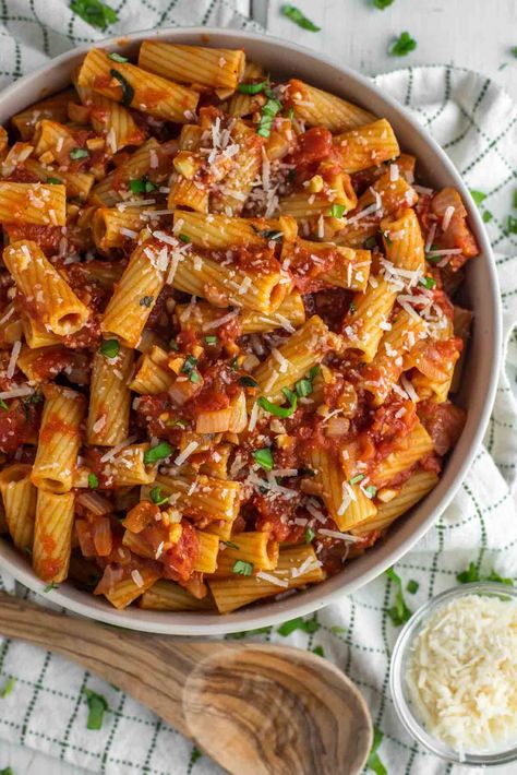 This rigatoni arrabbiata is a simple but tasty pasta tossed in a spicy tomato sauce loaded with garlic and fennel seeds. #rigatoniarrabbiata #rigatoni #spicypasta | chiselandfork.com Ground Beef Spicy Recipes, Rigatoni Arrabiata, Spicy Rigatoni Pasta With Chicken, Spicy Rigatoni, Spicy Vodka Rigatoni Recipe, Carbone Spicy Rigatoni Recipe, Kielbasa Sausage Recipes, Kielbasa Sausage, Butter Pasta