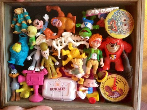 Found a box of old McDonald's Happy Meal toys in my attic.  Saw a pin of old matchbox cars mounted into a shadow box frame and so I just picked out the toys that would fit in a shadow box frame I had. Just search "shadow box ideas for toys". Old Mcdonalds Toys, Diy Old Toys, Repurposed Toys, Upcycle Toys, Old Fashioned Key, Shadowbox Art, Best Christmas Toys, Wedding Shadow Box, Memory Boxes