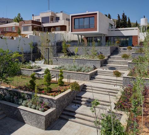 Terraced Landscaping Provides This Home With Multiple Gardens Terraced Garden, Terraced Landscaping, Terraced Backyard, Landscaping A Slope, Landscape Stairs, Sloped Yard, Sloped Backyard, Terrace Garden Design, Hillside Landscaping