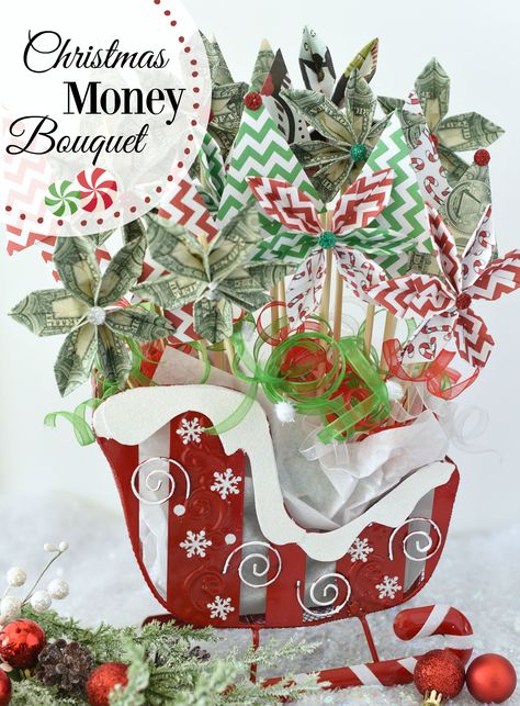 Cute Christmas Money Bouquet! Give the gift of money but add a little flare to it with this money bouquet! #gift #moneybouquet #fungiftideas #fungift Money Gifts Christmas Creative, Christmas Tree Money Gift Ideas, Christmas Money Origami Easy, Folded Money Christmas Tree Dollar Origami, Christmas Money Oragomi, Ways To Give Money, Money For Christmas, Giving Money, Holiday Money