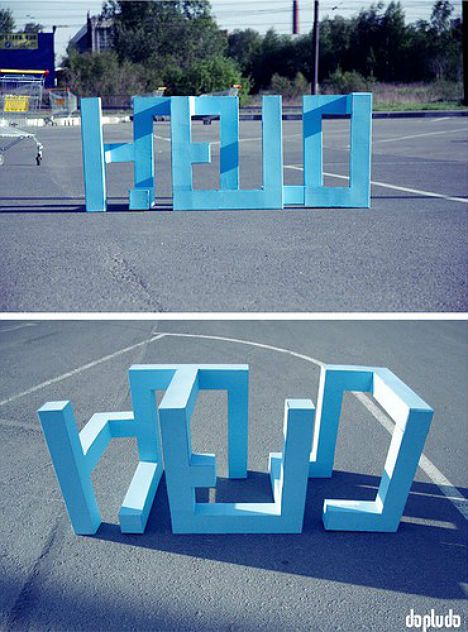 'In this clever work by Dopludo Collective, three-dimensional shapes that stand up on their own in a parking lot reveal themselves to be a word when viewed from a certain angle. Art Installation Outdoor, Text Sculpture, Typographic Installation, Typography Installation, Text Installation, Illusion Sculpture, Street Typography, Urban Art Installation, Graffiti Tags