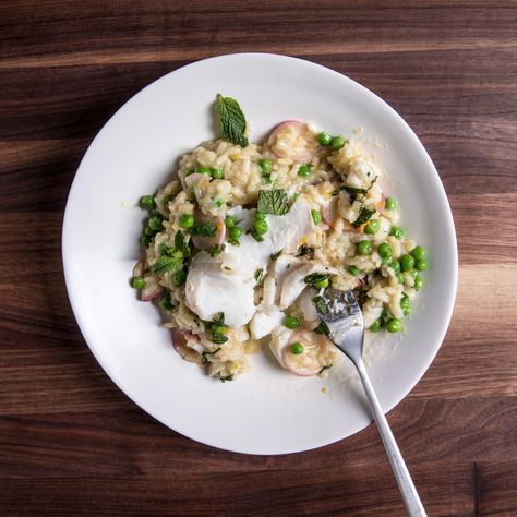 This easy white fish risotto gets flavor from citrus, mint and thyme. Get the recipe at Food & Wine. Fish Risotto, First Course Recipes, Bacon Risotto, Vegetarian Risotto, Rice In The Oven, Quinoa Risotto, Best Risotto, Lobster Risotto, Cauliflower Risotto