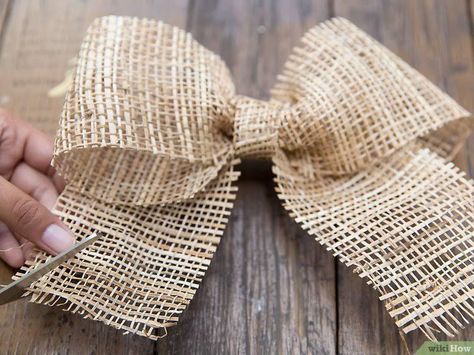 3 Ways to Make a Burlap Bow - wikiHow Burlap Ribbon Bow, Easiest Burlap, Chair Bows, Burlap Bow, Burlap Bows, Wooden Gift Boxes, Wedding Bows, Burlap Ribbon, Bow Flats