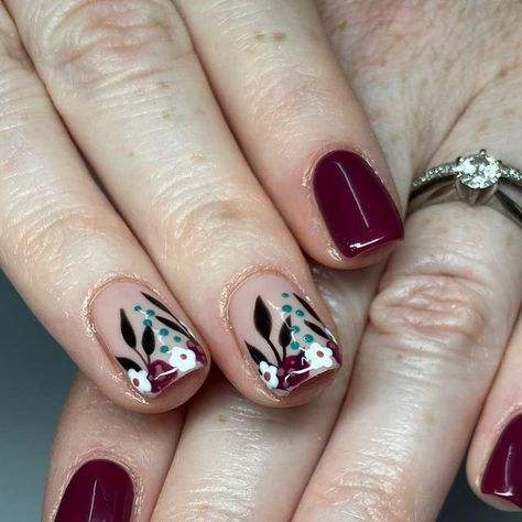 Lydia Bufton on Instagram: "💐💜Burgundy florals💜💐 . Inspo @bioseaweedgel . #gelnails #handpainted #gelmanicure #nails #nailsofinsta #nailsoftheday #nailsnailsnails #nailstyle #nailsofinstagram #nailart #nailsdesign #floral #burgundy #floralnails #autumn #autumnnails #autumnal" Burgundy Bridal Nails Wedding, Floral Red Nails, Burgundy Floral Nails, Burgundy Autumn Nails, Autumn Nails Burgundy, Burgundy Flower Nails, Dark Flower Nails, Burgundy And Navy Nails, Winter Floral Nails