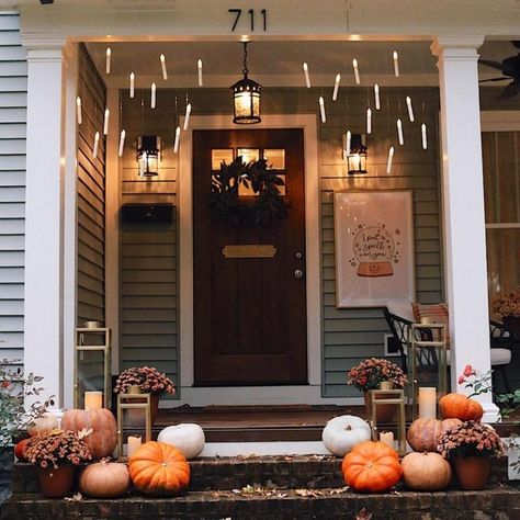 10 Halloween Porch Décor Ideas | Family Handyman Floating Candles Halloween Porch, Aesthetic Halloween Porch, Classic Halloween Porch Decor, Wrap Around Porch Halloween Decor, Pirate Front Porch Halloween, Small Porch Halloween Decor, Window Autumn, Halloween Front Porch Ideas, Pumpkin Spray Paint