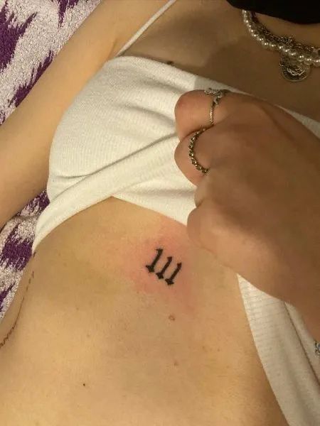 111 Neck Tattoo, Dino Tattoos, 111 Tattoo, Tattoo Under Chest, Under Chest Tattoo, Infinity Symbol Tattoo, Places For Tattoos, Small Chest Tattoos, Number Tattoos