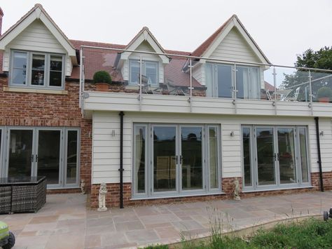 Cream Cladding Exterior, French Grey Windows Exterior, Painswick Green Windows, Painswick Windows And Doors, Painswick Grey Windows, Green Windows Exterior, Painswick Windows, Window Colours Ideas Exterior, Rendered House Exterior Uk