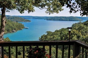 How to Experience 8 of the Best Beaver Lake Activities | Beaver Lake Cottages Lake Cottages, Halloween City, Eureka Springs Ar, Lake Activities, Eureka Springs Arkansas, Ozark Mountains, Eureka Springs, Lake Cottage, Free Vacations