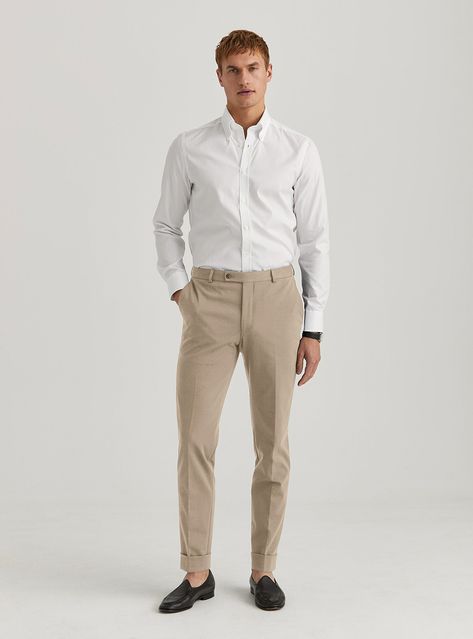 Achieve a chic, polished look with a classic white button-down shirt and tan dress pants, complemented by stylish black slipper loafers. Perfect for those who appreciate a clean and sophisticated outfit for any professional or social occasion. Men White Shirt Outfit, Tan Pants Outfit, Dinner Outfit Men, Men Wedding Attire Guest, Cream Linen Pants, Slipper Loafers, Christmas Choir, Tan Dress Pants, Mens White Dress Shirt