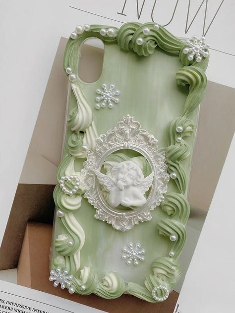 Pastel Green Decoden Phone Case for All Brand, Angel and Frame Phone Case with Small Decor, Handmade iPhone 14 Case, Samsung, Android All model available. Leave messages for us if your model is not list above. Decoden Phone case need 10-15 days to dry out. We will send out your package as soon as possible. ❗️About Product - Every decoden product is made by hand, so we can not guarantee that the product will as same as the one in picture, and there may have some small differences and imperfections. So every product is unique, and I think this is the charm of handwork.  - Please keep away from children and pets and advise them not to put it into there mouths.  - You can wash it or wipe it but do not put decoden products under direct sunlight or high temperature.  - We do not accept any retur Decoden Phone Case Simple, Frosting Phone Case, Custom Phone Cases Diy, Diy Resin Phone Case, Green Phone Case, Decoden Phone Case, Handmade Phone Case, Kawaii Phone Case, Pretty Phone Cases