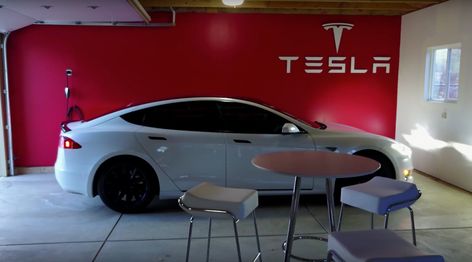 Model S owner transforms home garage into a Tesla gallery showroom Tesla Garage, Tesla Showroom, Garage Paint Colors, Garage Epoxy, Tesla Electric Car, Garage Paint, Garage Storage Inspiration, Tesla Owner, Garage Remodel