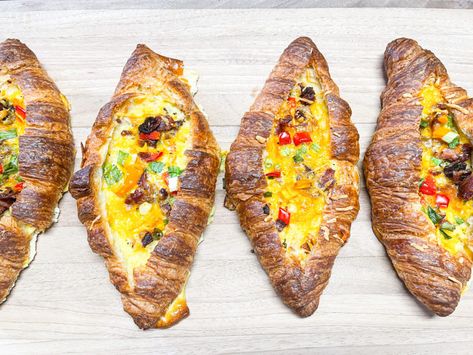 Croissant Omelet Boats – Catherine's Plates Catherine's Plates, Egg Boats, Cheese Croissant, Breakfast Platter, Bacon Egg And Cheese, Christmas Morning Breakfast, Bacon Cheddar, Crumbled Bacon, Bacon Egg