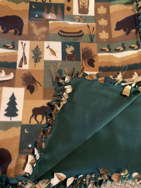 Great outdoor theme pattern with a solid dark green back. Handmade fleece tie blanket that is very soft to cozy up with. 66in by 54in Cute Fleece Tie Blanket, Western Tie Blanket, Knotted Blanket Diy, Tie Knot Blanket Ideas, Tie Blanket Ideas, Tie Blankets Fleece, Tye Blankets, Fleece Blanket Ideas, Tie Knot Blanket