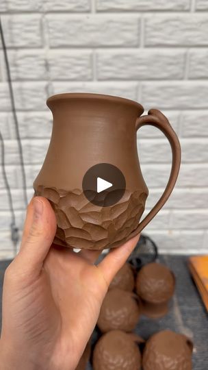 16K views · 880 reactions | For ages I’ve wanted to make sensory mugs. I just didn’t know how to make them in my own way. Enter my chocolate colored clay—a gorgeous clay that fires to a dark chocolate color, and would be a crime to cover up completely. The facets are smooth enough to be comfortable on your hands, but provide you a little bit of sensory input as you run your hands over the bottom. The smooth top and the handle will be glazed. I really like how these came out! I plan on trying the style with bowls next!

Tools used: 
Fluting tool: @xiem_clay_center 
Trimming spinner: @sanbaostudio 

#pottery #fidgetmug

📵 No reposting to repost accounts | Pottery by Danielle | Ariana Grande · we can't be friends (wait for your love) How To Make A Mug Out Of Clay, Attach Handle To Mug, Mug Handles Pottery How To, Hug Mug Pottery, Crochet Mug Hug, Dark Chocolate Color, Make A Mug, Chocolate Color, Dark Chocolate