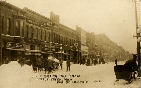 Horse-drawn sleighs and sleds on snow-covered street, Battle Creek, Michigan Michigan History, Lake House Signs, Battle Creek, Cottage Interior, Horse Drawn, My Town, Lake House, Michigan, Cold Water