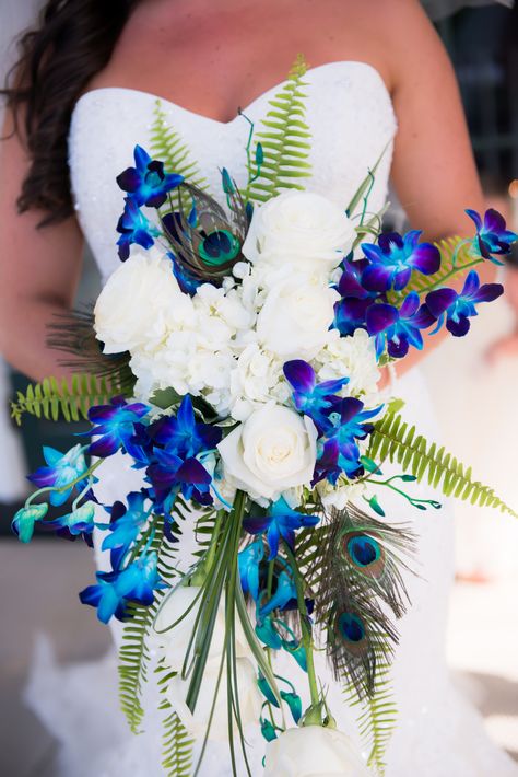 Peacock Wedding Bouquet, Blue Orchid Wedding, Blue Dendrobium Orchids, Blue Flowers Wedding, Orchid Bouquet Wedding, Galaxy Wedding, Peacock Wedding Theme, Cascading Wedding Bouquets, Purple Wedding Bouquets