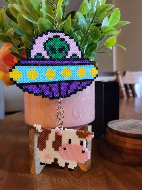 Tarot Perler Beads, Perler Bead Dream Catcher Pattern, Cow Perler Beads, Alien Perler Beads, Festival Trinkets, Alien Perler, Cute Perler Bead Patterns, Perler Bead Magnets, Perler Bead Keychain