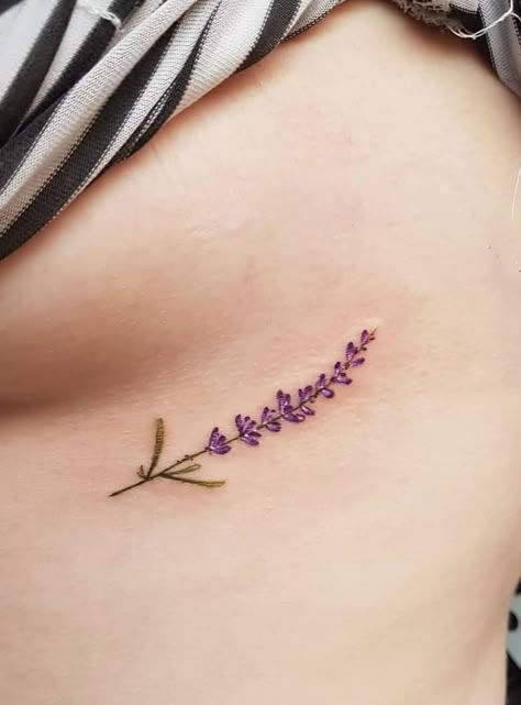 Purple Lavender Tattoo, Lavender Tattoo Aesthetic, Lavender Rib Tattoo, Lavender Tattoo Behind Ear, Simple Lavender Tattoo, Lavender Spine Tattoo, Small Lavender Tattoo, Lavender Tattoos, Lilac Tattoo