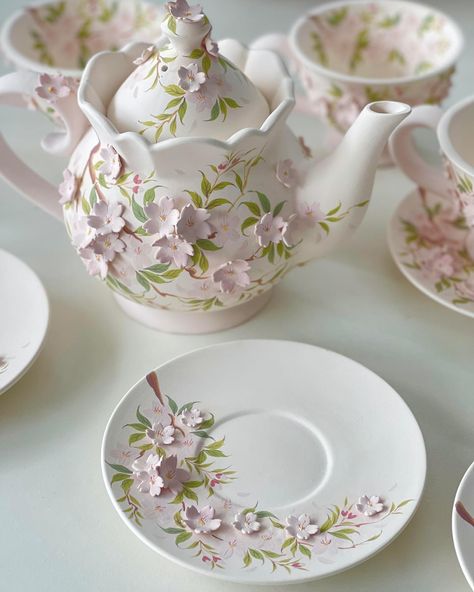 Cherry teaser 🎀before put in kiln ✨Hope its final effect would be good😌#ceramic #ceramics #ceramicstudio #ceramicart #ceramicartist #handmade #handmadegifts #diy#pottery #teapot #teatime #teaset #tea #tealover #coffeetime #coffeetime #makelifearide #coffeelover #flowers #floral #floraldesign #cherryflower #foryoupage Pink Tea Party, Aesthetic Items, Cherry Flower, Clay Diy Projects, Clay Craft, Painted Christmas Ornaments, Home Garden Design, Pottery Crafts, Diy Pottery