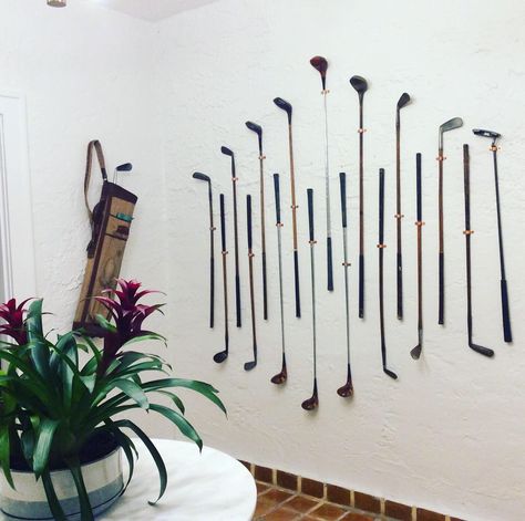 Decorating With Golf Clubs, Golf Basement Ideas, Golf Themed Living Room, Golf Club Decor, Vintage Beach Decor Coastal Style, How To Hang Golf Clubs On The Wall, Golf House Decor, Golf Office Decor, Golf Decorating Ideas Interior Design