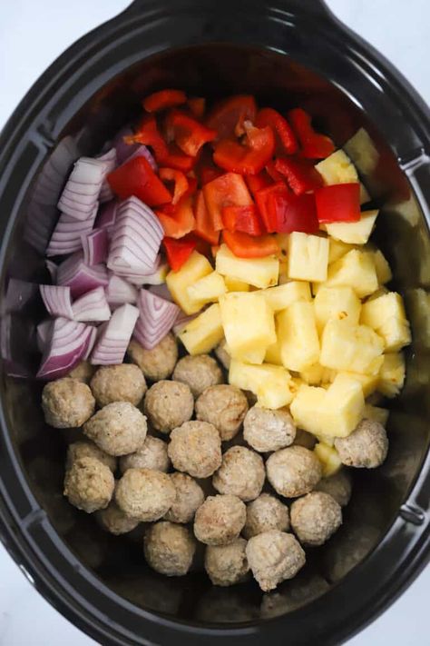 This Sweet and Sour Meatballs recipe is an easy slow cooker meal that works equally well as an appetizer or as a main course. They’re made with either frozen or fresh meatballs, and covered in a delicious sweet and sour sauce along with pineapples, onions, and peppers. #thecarefreekitchen #meatballs #sweetandsour #asian #pineapple #easydinner #crockpot #slowcooker #appetizer Meatballs With Pineapple And Peppers, Meatballs With Peppers And Onions, Pineapple Meatballs Crockpot, Sweet And Sour Meatballs With Pineapple, Chicken Pineapple Meatballs, Meatball Pineapple Smokies, Sweet And Sour Meatballs Crockpot, Fresh Meatballs, Frozen Meatballs Crockpot