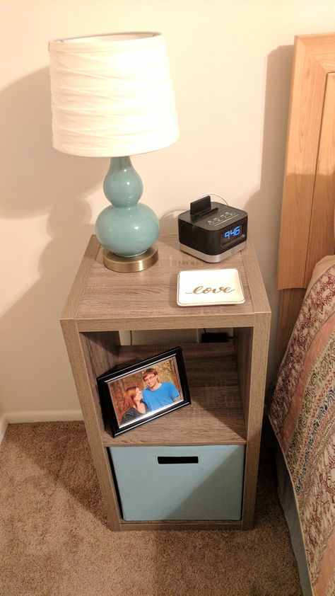 Storage cubes as a nightstand ... Minimalist styling Storage Cube Nightstand, Cube Storage Night Stand, Cube Organizer Night Stand Ideas, Cube Shelf Next To Bed, Cube Storage As Nightstand, 2 Cube Organizer Ideas, Cube Nightstand Ideas, Cube Storage Nightstand, Cube Organizer Nightstand