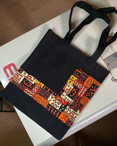 Afrocentric tote bag design made for a customer Price N4500 #totebag #totesteeshub #weddingsouvenirnigeria #topqualitytotebags #totebagsinabuja #madeinabuja #brandsouvenir #brandedtote #weddinggiftitems #weddingsouvenirs #weddingtotebagdesigns #totebags #totebagsforstudent Bags Inspiration, Diy Hair Accessories Ribbon, Handmade Fabric Bags, African Designs, Bags Diy, Bag Trends, Handmade Fabric, Bag Design, Diy Hair Accessories