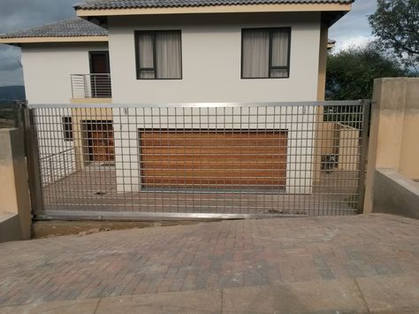 Beautiful Stainless Square Tube Frame Gate with Round in fills #design #steelimage Stainless Steel Balustrade, Wood Staircase, Glass Staircase, Fire Pit, Gate, Garage Doors, Square, Outdoor Decor, Frame