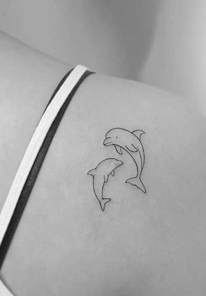 Tiny Dolphin Tattoos For Women, Cool Dolphin Tattoo, Small Dolphin Tattoo Ideas, Fine Line Tattoo Dolphin, Minimal Dolphin Tattoo, 2 Dolphin Tattoo, Dainty Dolphin Tattoo, Small Dolphin Tattoo Simple, Dolphin Line Tattoo