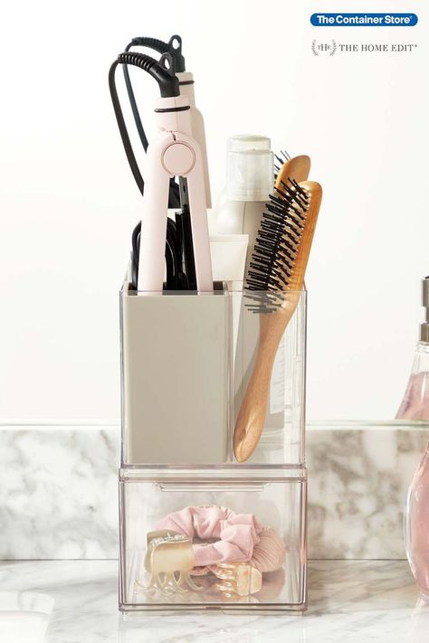 Sometimes, getting started is the hardest part of getting organized. That's why we created Starter Kits. For this kit, we've pulled together essentials from The Home Edit by iDesign Vanity & Makeup Collection to get your hair tools and makeup in order and maximize your bathroom countertop space. The Home Edit Space-Saver Style Station Starter Kit includes staples from our exclusive product line from The Home Edit: (1) T.H.E. Hair Tool Holder and (1) T.H.E. Small Deep Drawer. Makeup In Order, Hair Tool Holder, Bathroom Organization Countertop, Beauty Station, Tips For Organizing, Makeup Order, Face Tools, Makeup Containers, Makeup Station