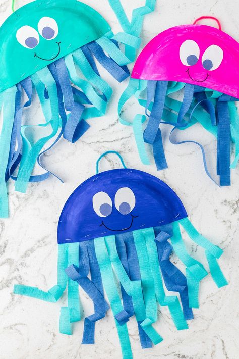 Ocean Art Projects For Kids Toddlers, Easy May Crafts For Kids, Toddler Spring Crafts Easy, Rainbow Fish Paper Plate Craft, Jellyfish Paper Plate, Paper Plate Spring Crafts, Star Fish Craft For Toddlers, Jelly Fish Art And Craft, Jellyfish Art And Craft