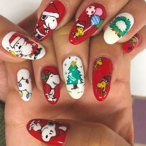 Fun Winter Nails 2023-2024: 19 Playful Ideas - thepinkgoose.com Peanuts Christmas Nails, Christmas Nails Characters, Character Christmas Nails, Christmas Snoopy Nails, Snoopy Nails Christmas, 7 Cartoon Characters, Charlie Brown Christmas Nails, Snoopy Christmas Nails, Christmas Character Nails