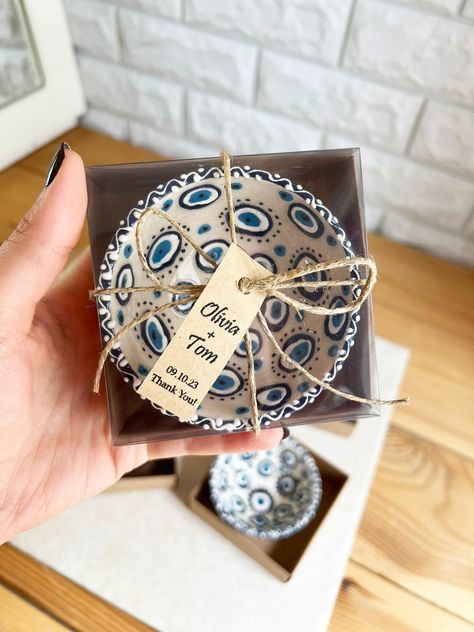 50 pcs Personalized Evil Eye Patterned Ceramic Bowls Favors! Your guests who come to your event will love these stylish and useful bowls! -> Great idea for wedding favors, bachelorette party favors, baby shower favors, party favors, bridal shower favors, quinceanera favors, first communion favors, graduation party favors, nikkah favors, communion favors, birthday party favors, thank you favors. -> You can also use it for promotional purposes for any of your events or stores. PRODUCT DIMENSIONS; Nikkah Favors, Evil Eye Wedding, Favors Quinceanera, Greek Wedding Favors, Bead Bowl, Wedding Favours Magnets, Twilight Wedding, Quinceanera Favors, Cyprus Wedding