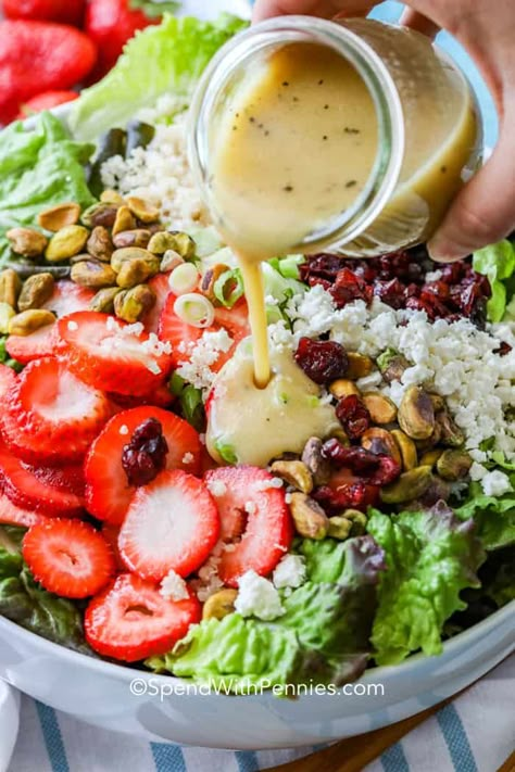 This pistachio strawberry salad recipe is a fresh, healthy, and delicious summer salad that will outshine any main dish. We love this easy side salad! #spendwithpennies #pistachio #strawberry #strawberrysalad #pistachiostrawberrysalad #salad #saladrecipe #easysalad #vinaigrette Strawberry Vinegarette Salad, Strawberry Praline Salad, Strawberry Lunch Ideas, Strawberry Lettuce Salad Recipes, Summer Lettuce Salads, Summer Salad Dressing Recipes, Fresh Lettuce Salad Recipes, Lettuce Salad With Strawberries, Salad Dressing For Strawberry Salad