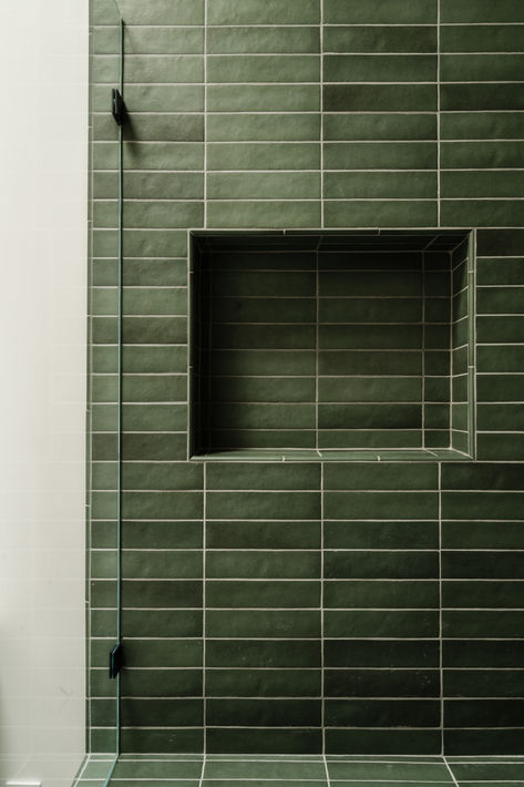 Horizontal stacked green tile in shower of this moody bathroom for a teenage boy, a style that will transition throughout the years. #thedendesigngroup #showertile #moodyshower #moodybathroom #greentile #horizontallystackedtile #bayareainteriordesign Bathroom Horizontal Tile, Green Tile Shower Niche, Green Shower Niche, Green Tile Bathroom With Tub, Horizontal Tile Shower Ideas, Green Bathroom Tiles Wall, Green Tile Black Grout, Horizontal Stacked Tile, Horizontal Stacked Subway Tile