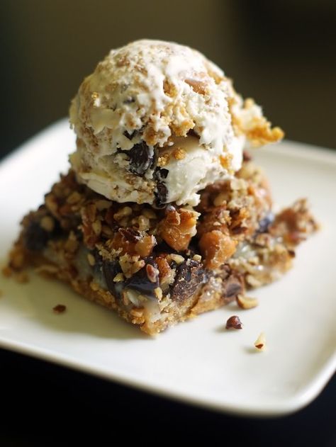 Takin' 7-Layer Cookies to the next level: a la Mode - Bake at 350° 7 Layer Cookies, Ice Cream Bars, Ice Cream Cookie Sandwich, 7 Layer, Butterscotch Chips, Ice Cream Cookies, Food Favorites, Cookie Bar Recipes, Chocolate Sauce