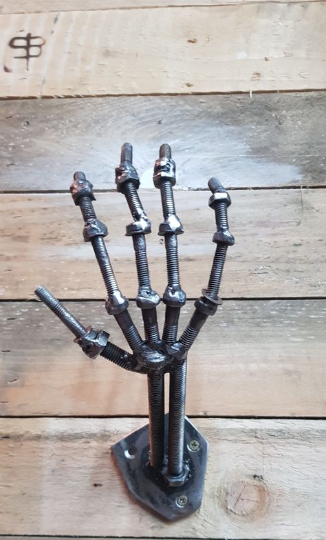 Scrap metal sculpture skeletons hand Welded Skeleton Hand, Welding Projects Sculptures & Statues, Skeletons Hand, Scrap Metal Sculpture, Junk Metal Art, Metal Skeleton, Scrap Art, Welding Art Projects, Metal Skull