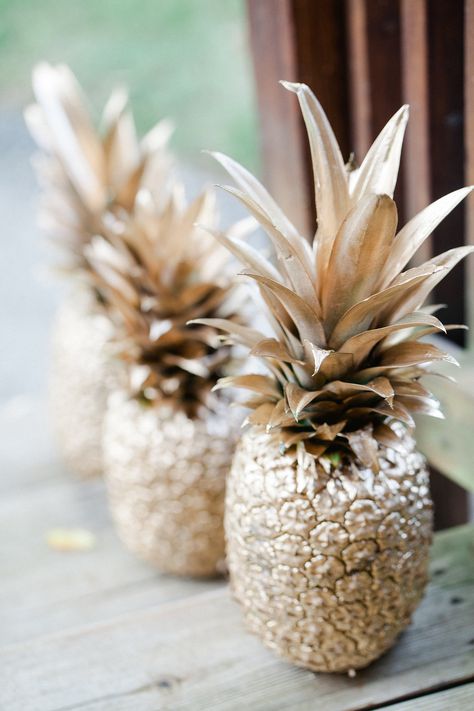 Spray-Painted Pineapples: Spray-painting real pineapples is a cheap and easy DIY, and they are a great addition to the party decor.  Source: KCB Photography Ibiza Party, Snowman Crafts Diy, Pina Coladas, Chic Bridal Showers, Tropical Bridal Showers, Tropical Bridal, Fiesta Tropical, Pineapple Parties, Bollywood Party