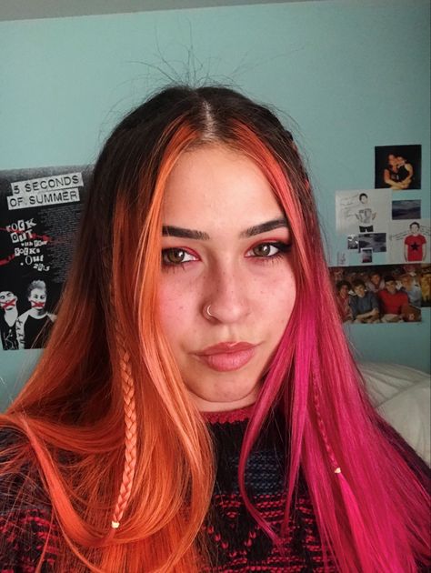 half pink half orange, split hair with cute little braids Orange Pink Highlights In Brown Hair, Split Dye Pink And Orange, Orange Multicolor Hair, Split Dyed Hair Red And Orange, Top Half Hair Dyed, Split Dye Balayage, Grown Out Split Dye, Pink And Orange Balayage, Half Orange Half Red Hair