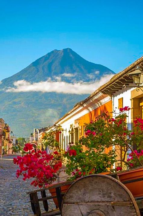 The Water Volcano overlooking the city of Antigua in Guatemala. Guatemala Travel, Guatemala City, Central America Travel, Oh The Places Youll Go, America Travel, Bolivia, Central America, Places Around The World, Belize