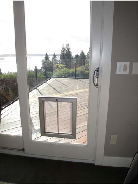 We couldn't find the original link, but my best guess is that the sliding doors are a special order with a cutout. The pet door is most likely made of plexiglass. Sliding Glass Dog Door, Diy Doggie Door, Pet Patio Door, Doggie Door, Sliding Screen Doors, Renovation Tips, Pet Doors, Pet Door, Cat Door