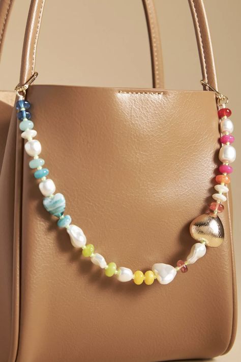 Tote Bag With Charms, Beaded Bag Charm, Bag Charm Trend 2024, Diy Beaded Bag, Anthropologie Bag, Diy Bag Charm, Ugg Coquette Slippers, 2024 Wardrobe, Key Change