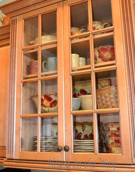 Displaying Dishes in Glass Cabinets Dishes In Glass Cabinets, Glass Door Kitchen Cabinets, Glass Door Cabinet Display, Displaying Dishes, Kitchen Nook Lighting, Glass Kitchen Cabinet, Unfinished Kitchen Cabinets, Glass Door Cabinet, Glass Kitchen Cabinet Doors